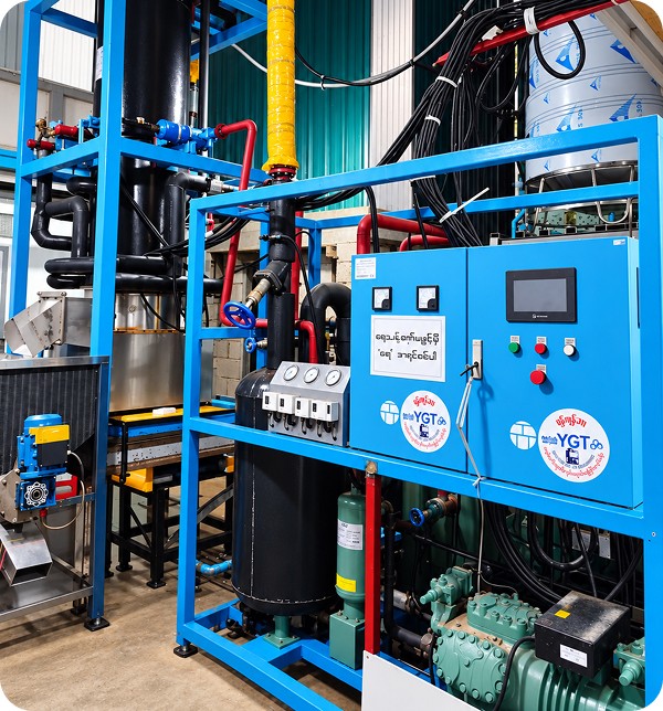 An ice machine installed by Yangon Thar, with its YGT-branded control panel and refrigeration compressor